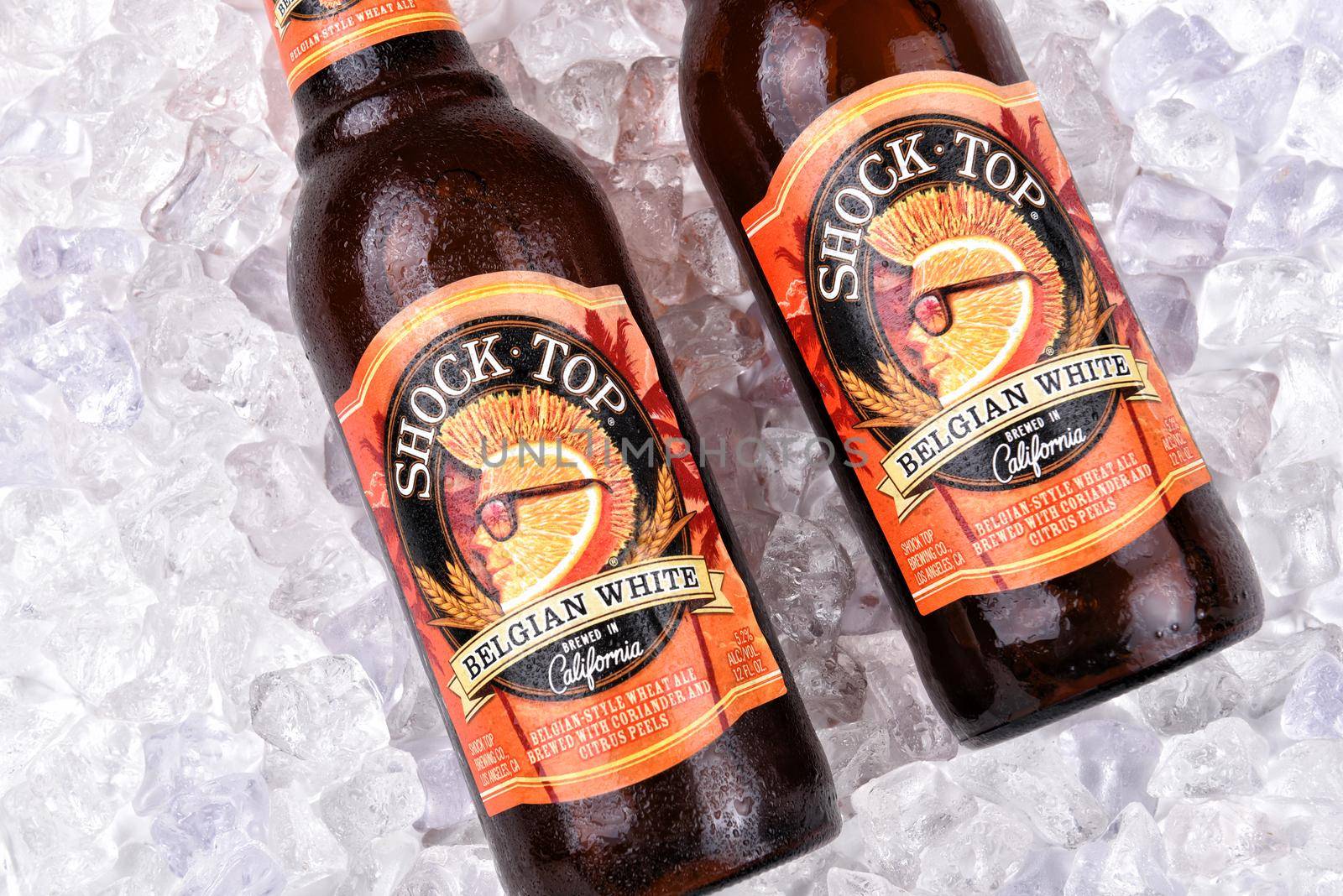 IRVINE, CALIFORNIA - AUGUST 25, 2016: Shock Top Belgian White bottles in ice. Introduced as a seasonal beer in 2006, it has, since 2007, been available year-round.