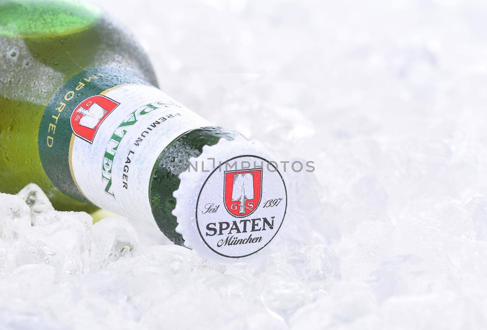 IRVINE, CA - AUGUST 26, 2016: A bottle of Spaten Lager on a bed of ice. The Spaten-Franziskaner-Brau GmbH is a brewery in Munich, Germany.