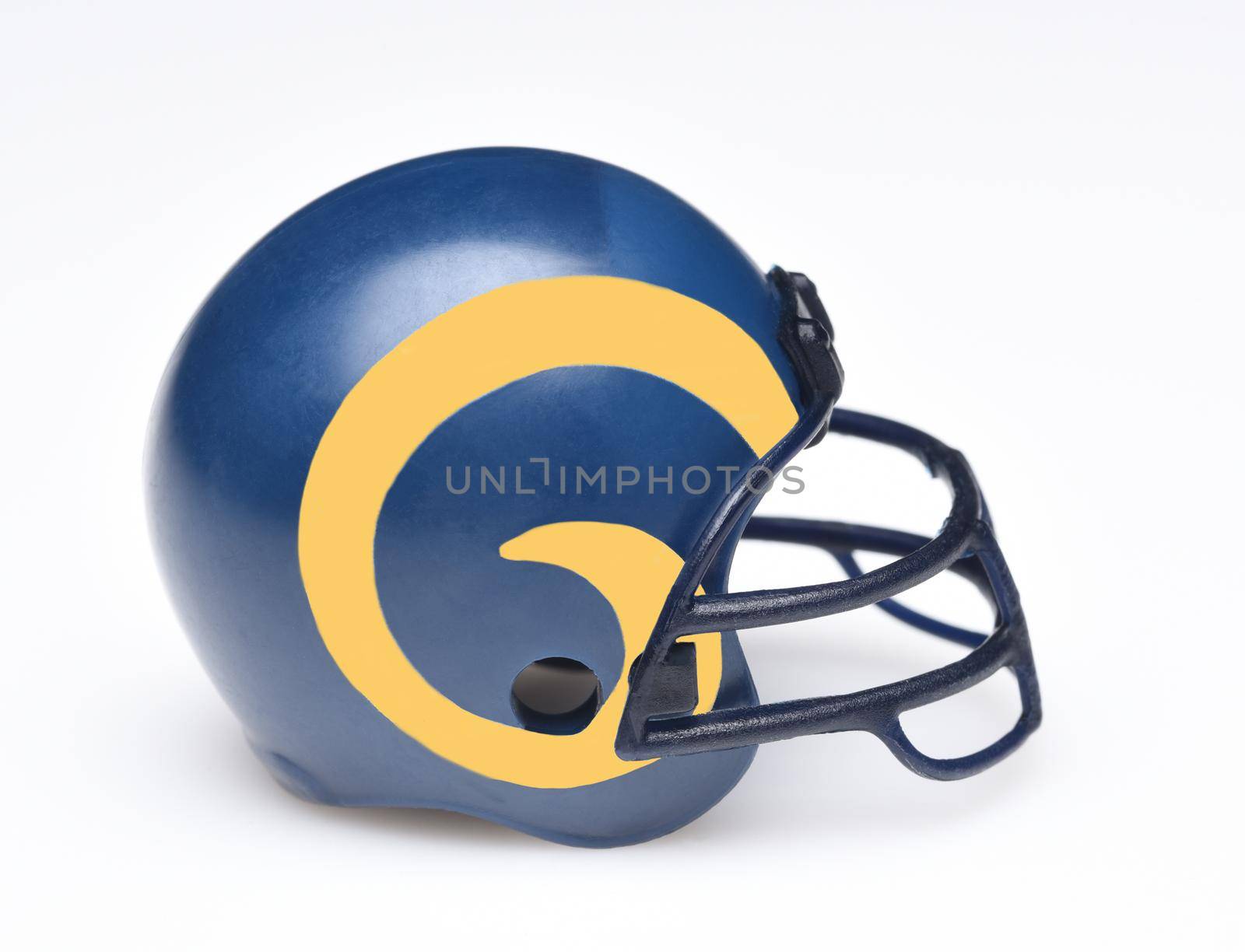 IRVINE, CALIFORNIA - AUGUST 30, 2018: Mini Collectable Football Helmet for the Los Angeles Rams of the National Football Conference West. by sCukrov