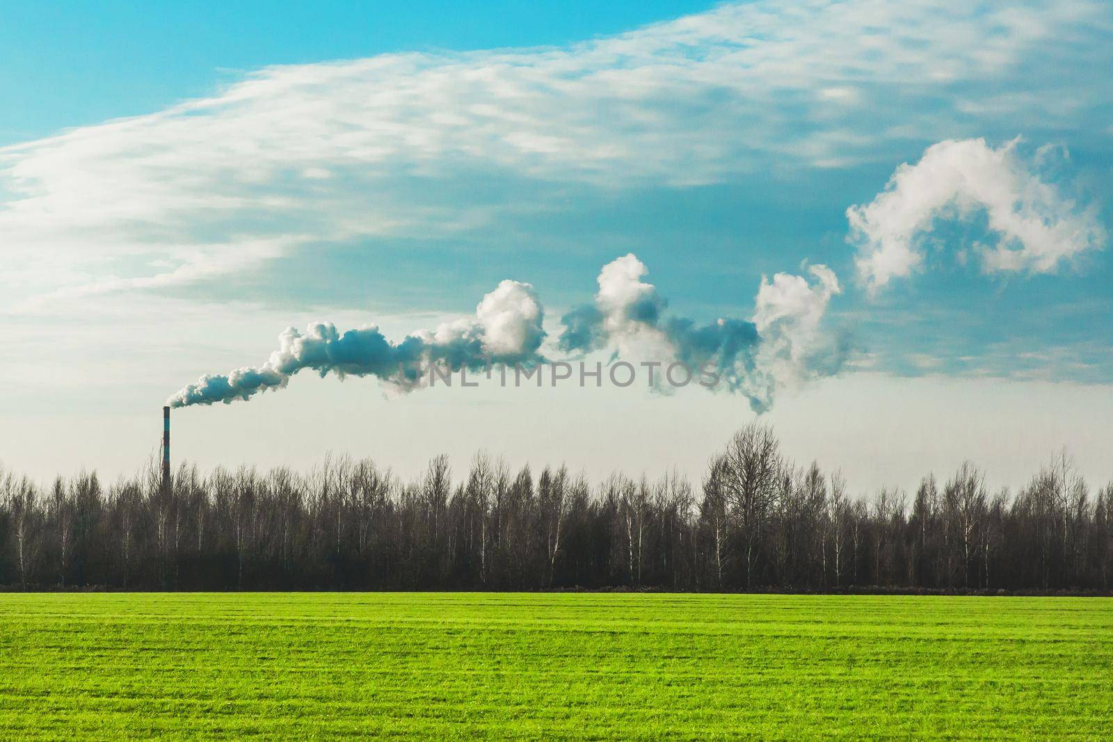 Environmental pollution, environmental problems, smoke from the chimney of an industrial plant or thermal power plant.