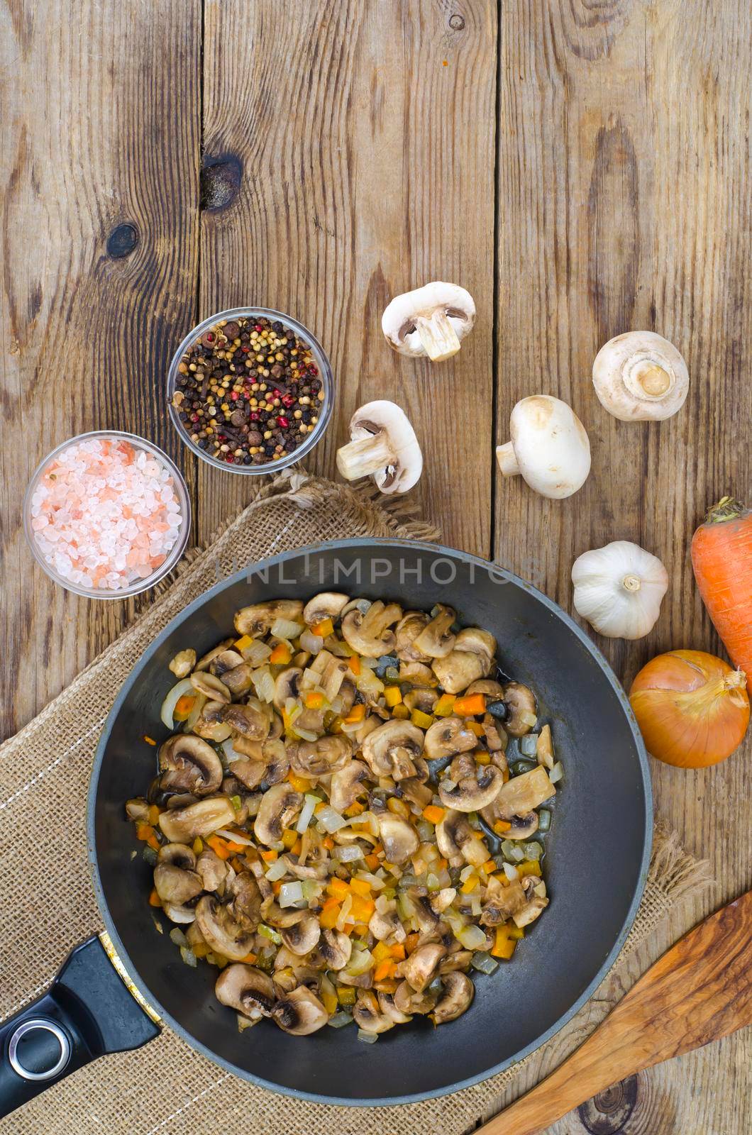 Frying pan with fried mushrooms, vegetarian dishes by ArtCookStudio
