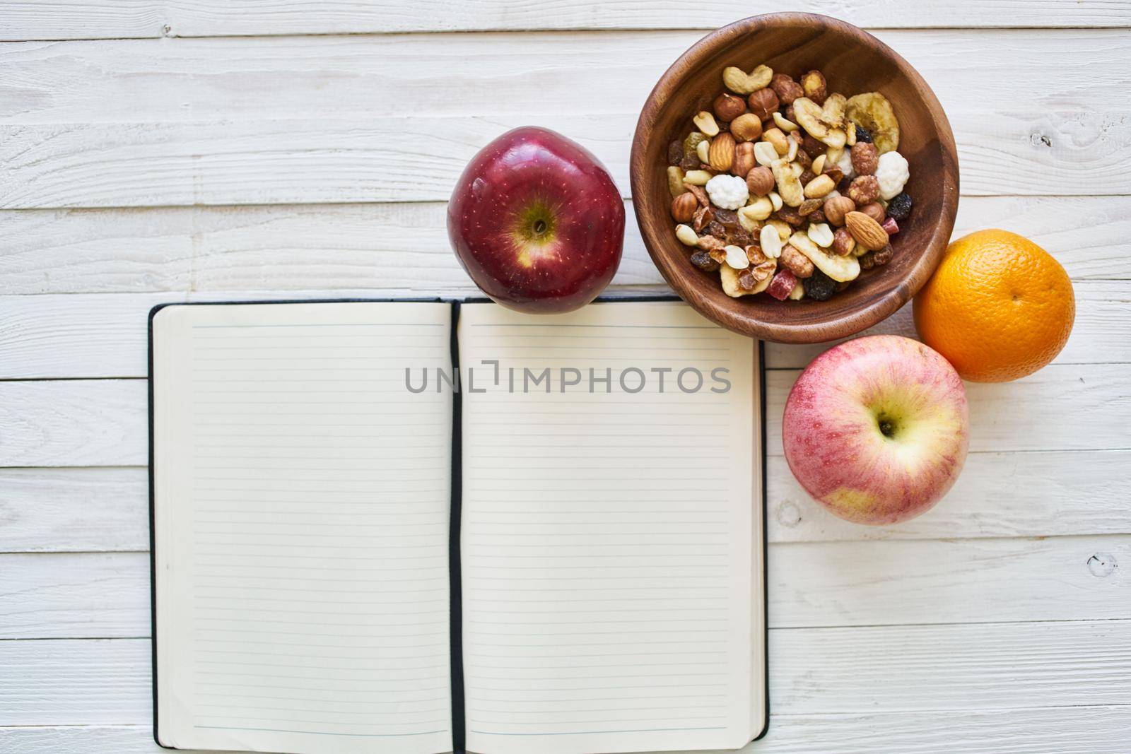 fruit cereals proper nutrition notepad breakfast diet top view. High quality photo