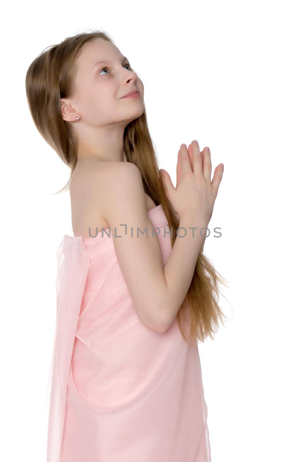 Beautiful little girl close-up. The concept of beauty and fashion, happy childhood. Isolated on white background.