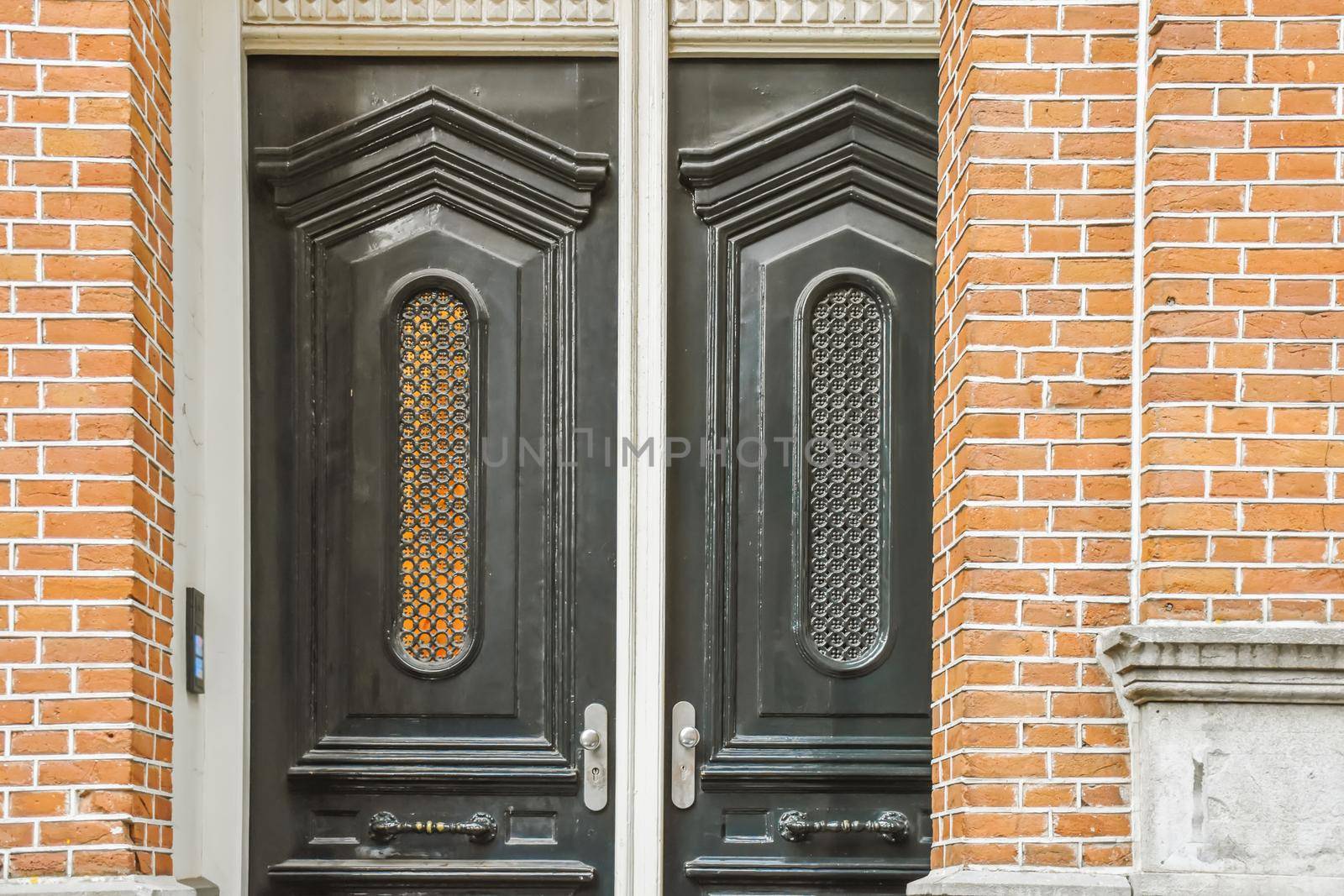 Double-sided entrance black door of the building