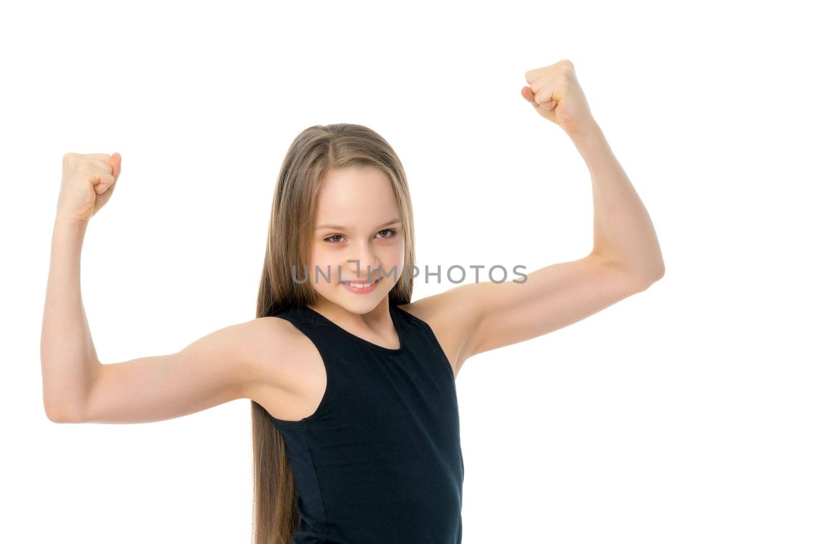 A little girl shows her muscles. by kolesnikov_studio