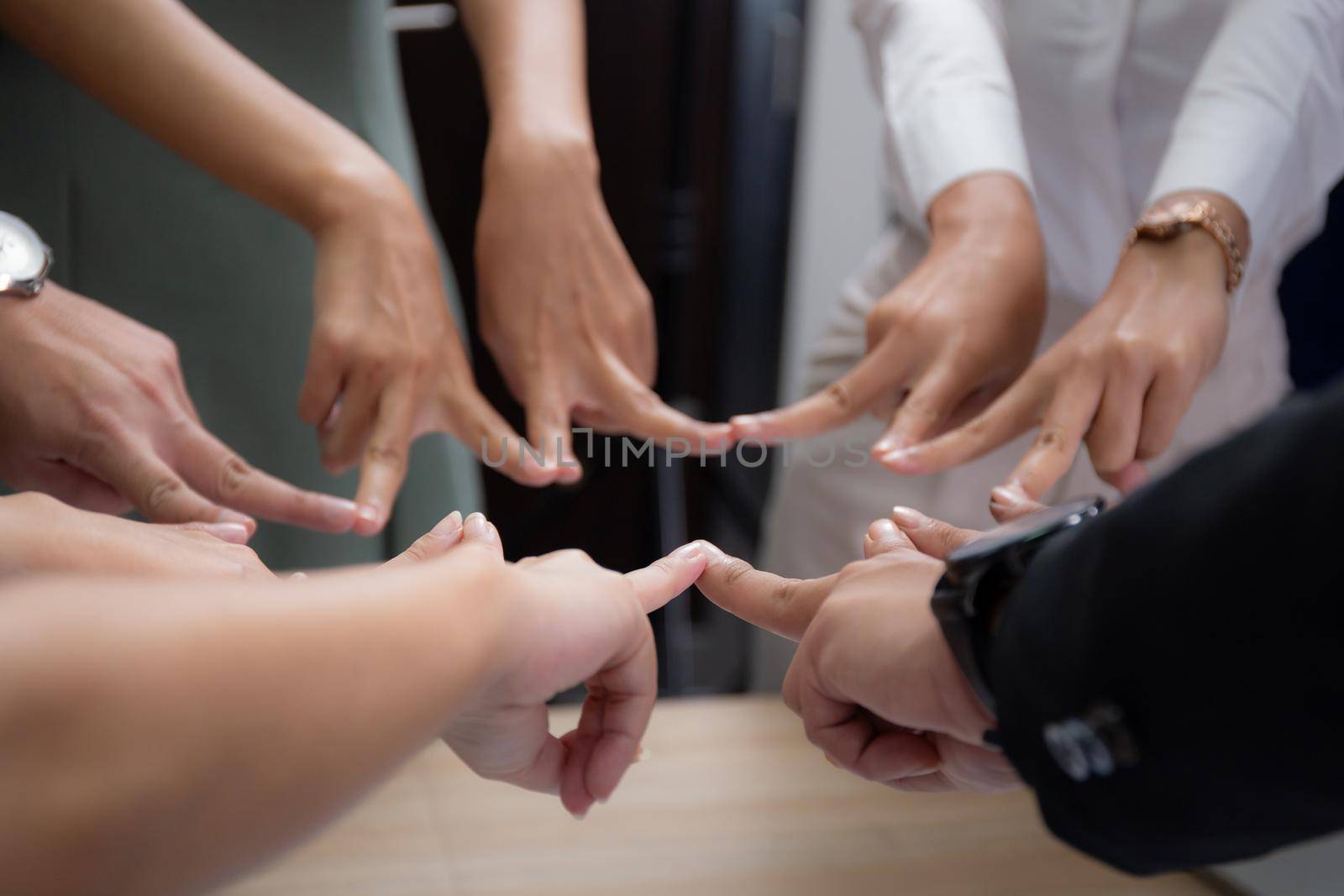 Hands of group team business people harmony together at the office, teamwork and successful, partnership and agreement, community and communication, trust of colleague, business concept. by nnudoo