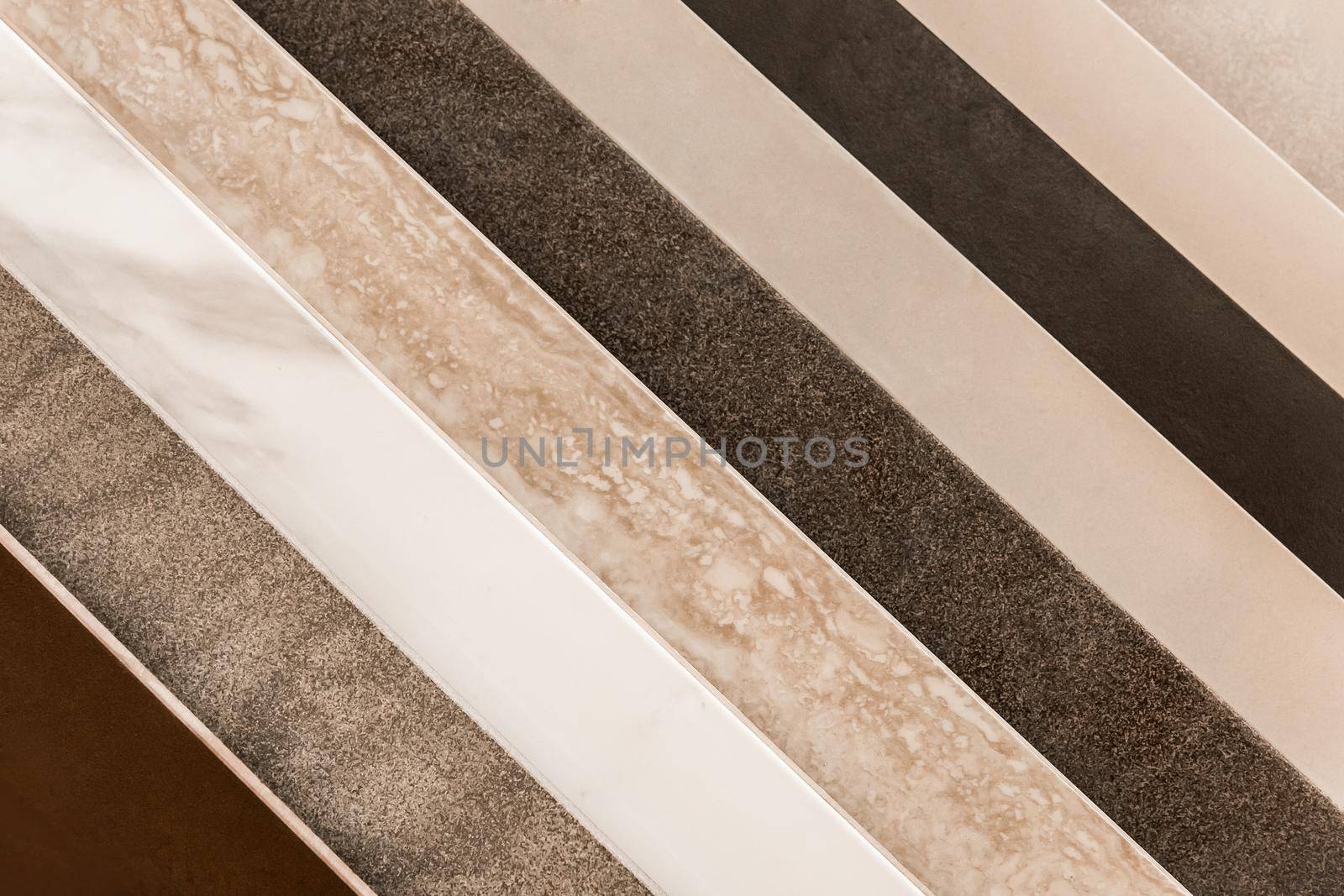 Texture decorative ceramic tile background, interior design colored tiles in diagonal lines close-up.