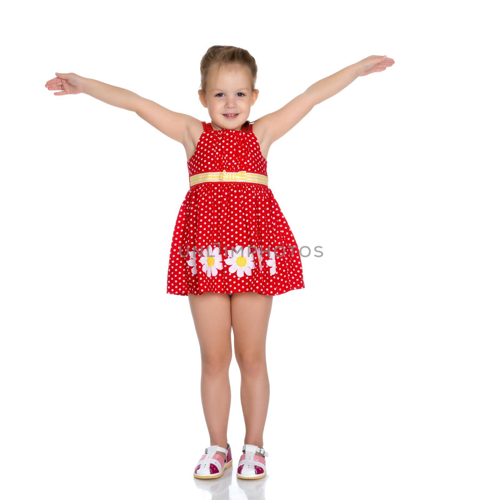 The little girl is full-length. The concept of family happiness, a child, childhood, play, beauty and fashion. isolated on white background