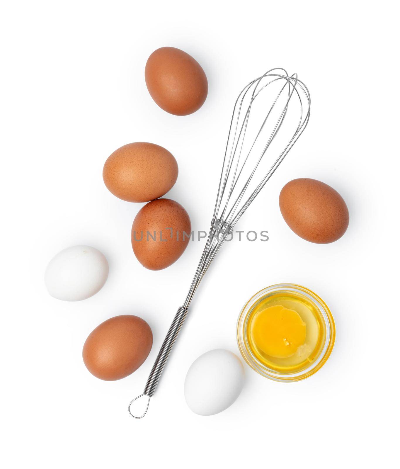 Fresh eggs with whisk isolated on white background, close up