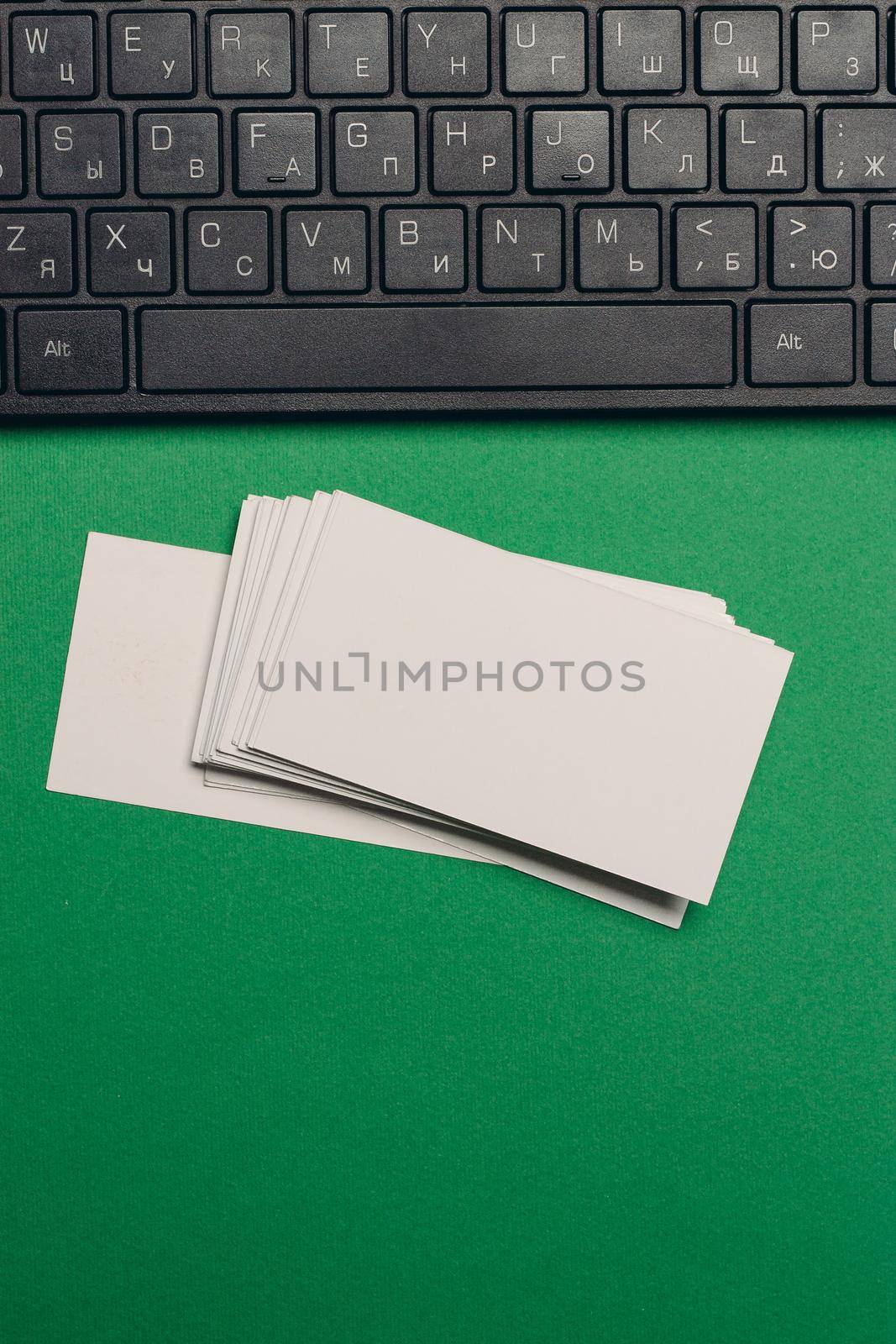 desktop keyboard business cards copy-space top view by Vichizh