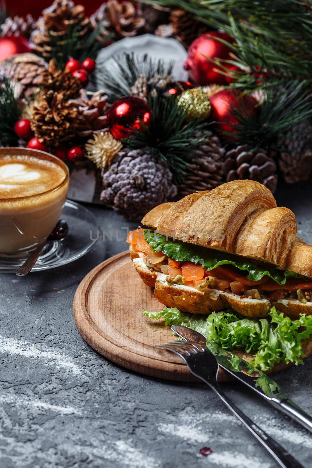 New Year's breakfast with croissants. New Year's croissant with red fish and avocado. New Year and Christmas concept by UcheaD