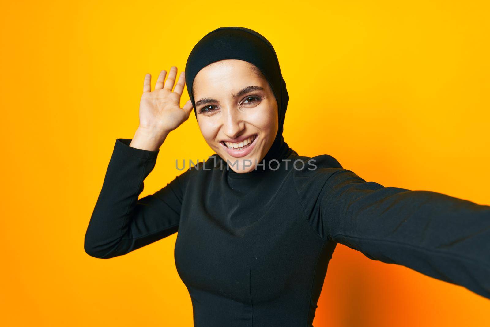 Muslim happiness fashion clothing hand gesture isolated background. High quality photo