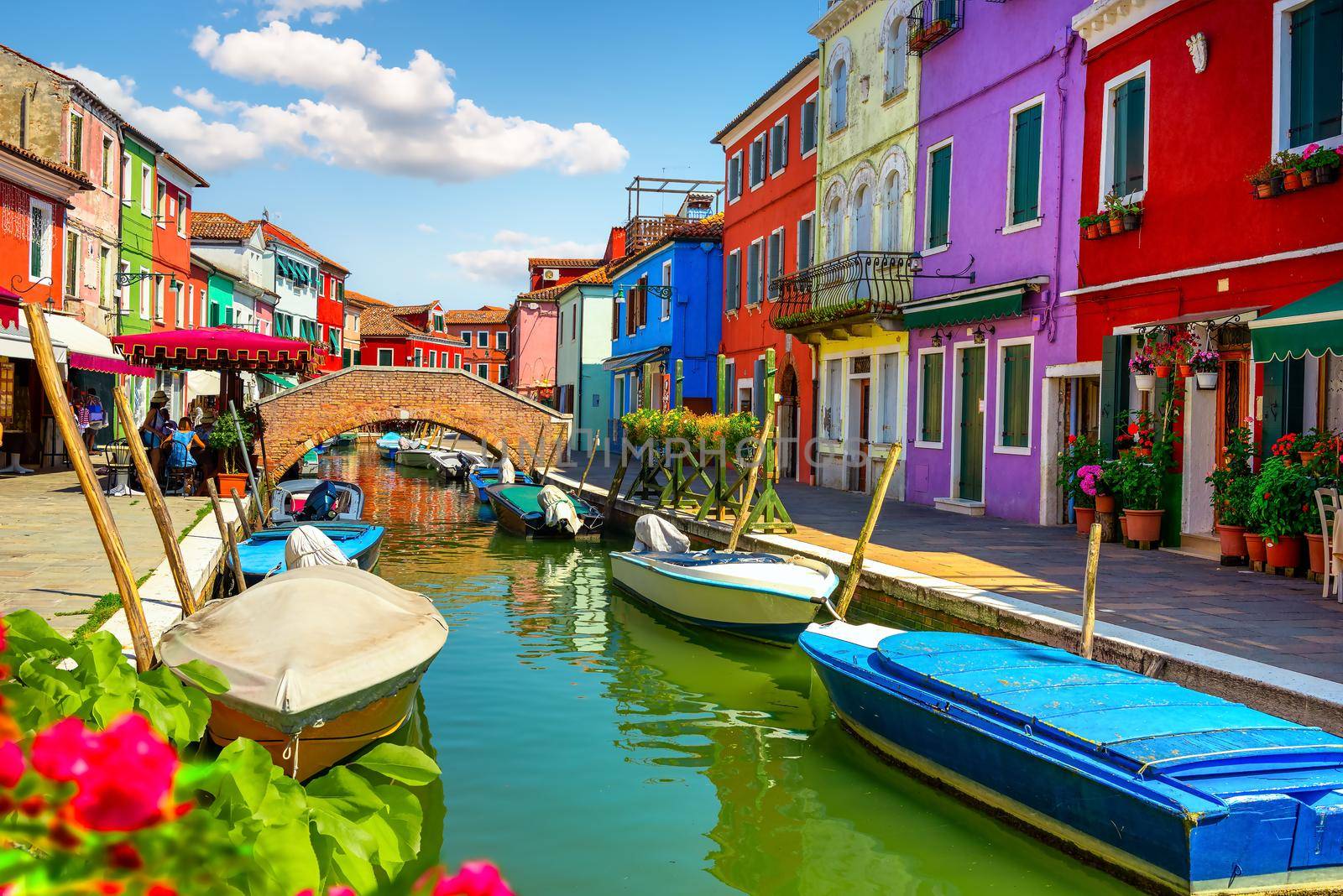 Bridge in colored Burano in summer, Italy