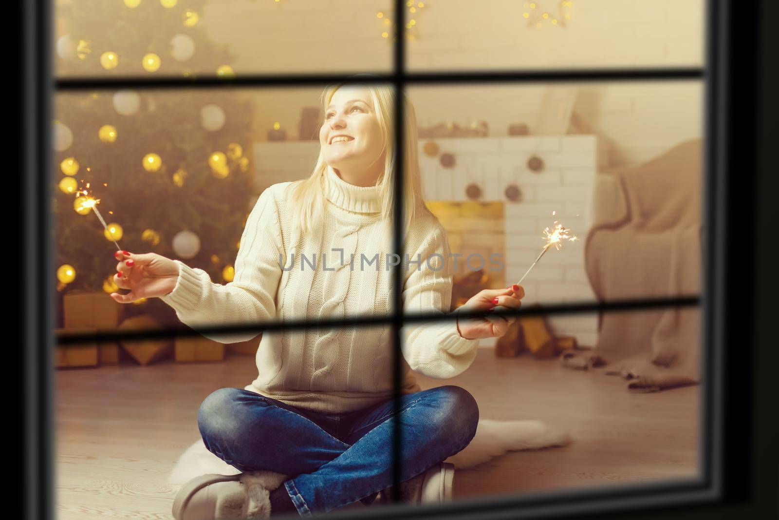 wiew through the window, Christmas Tree on background, winter holiday concept