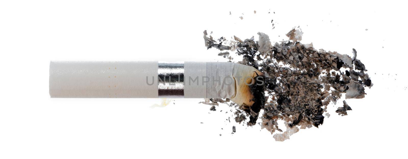 Extinguished cigarette butt isolated on white background close up
