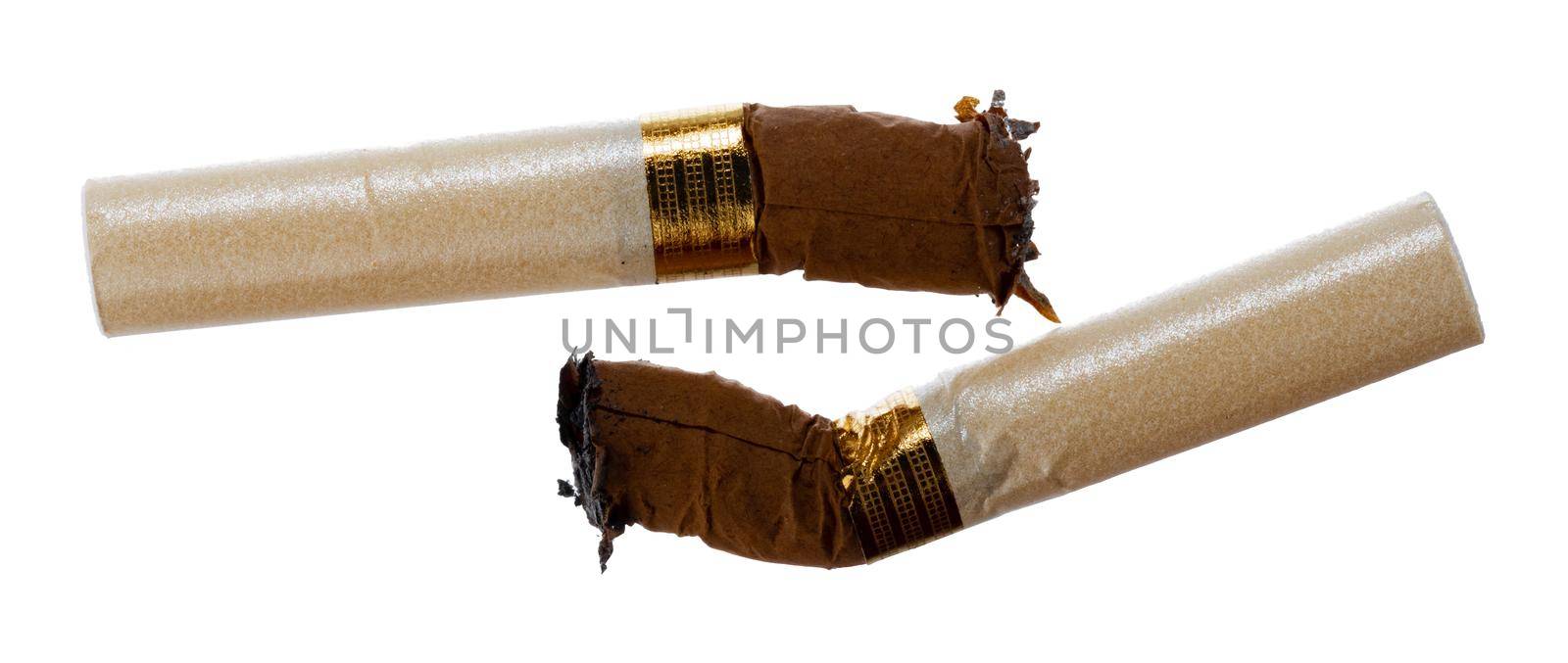 Extinguished cigarette butt isolated on white background close up