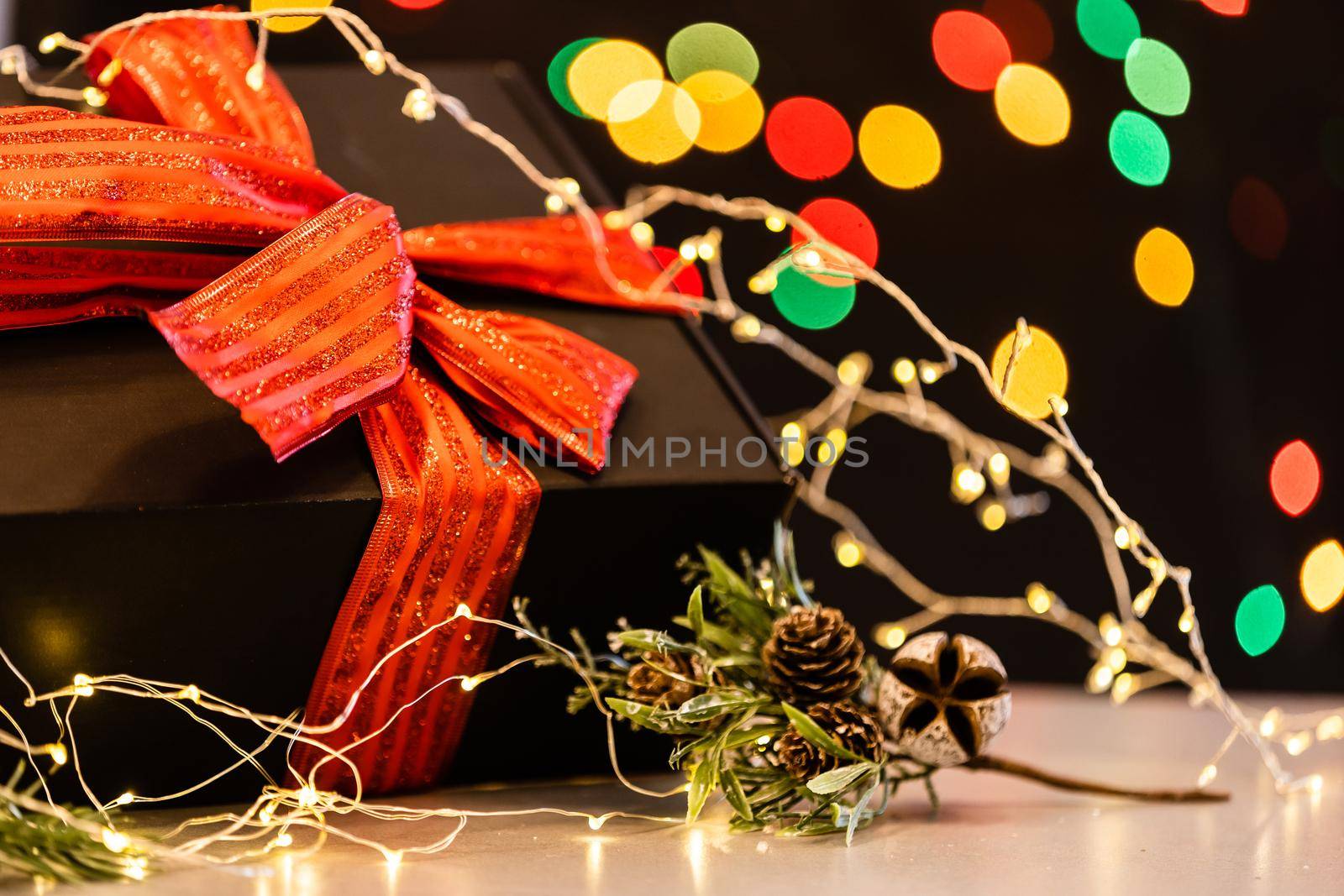 Christmas background with lights and free text space. Christmas lights. Glowing colorful Christmas lights on black background. New Year. Christmas. Decor. Garland