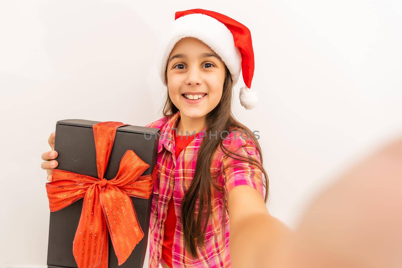 beauty child with christmas gift.