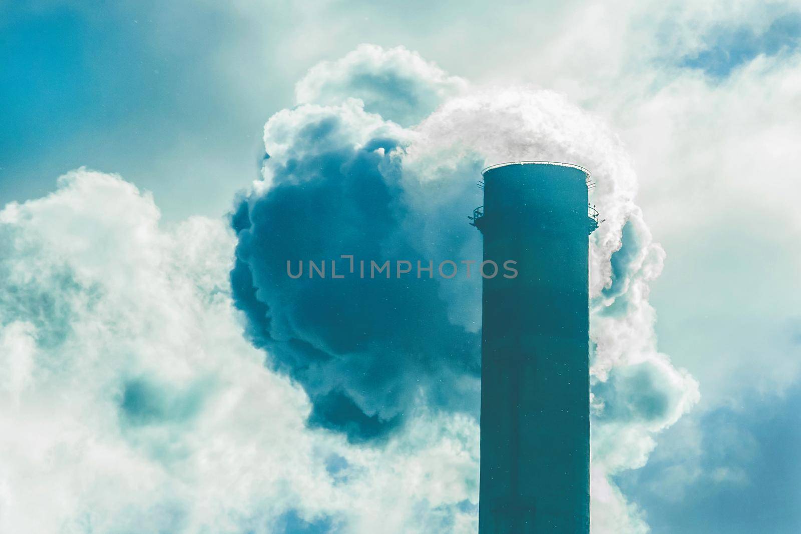 Environmental pollution, environmental problem, smoke from the chimney of a plant or thermal power plant against the sky by AYDO8