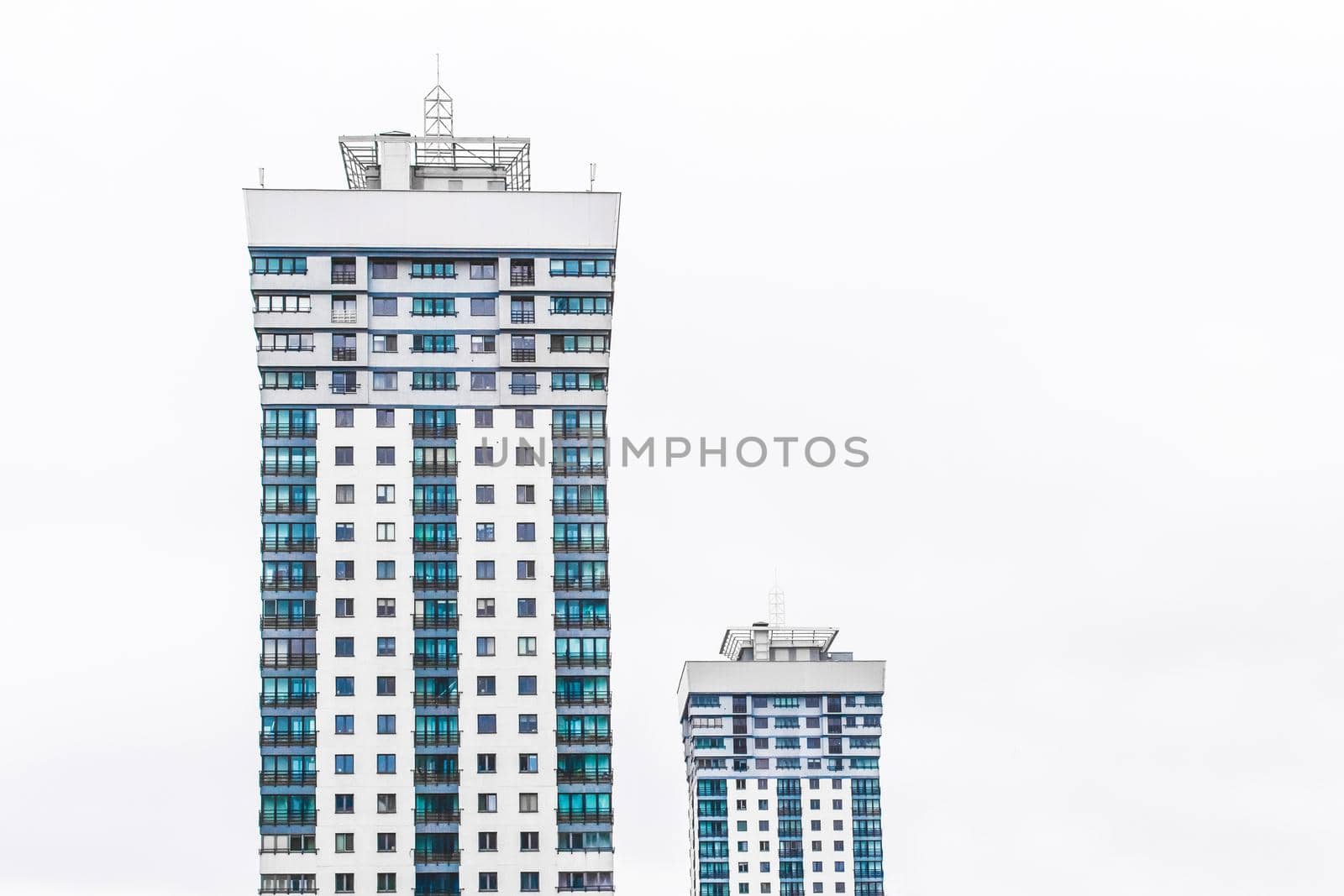 New modern high-rise apartment urban building exterior, facade of a residential city house.