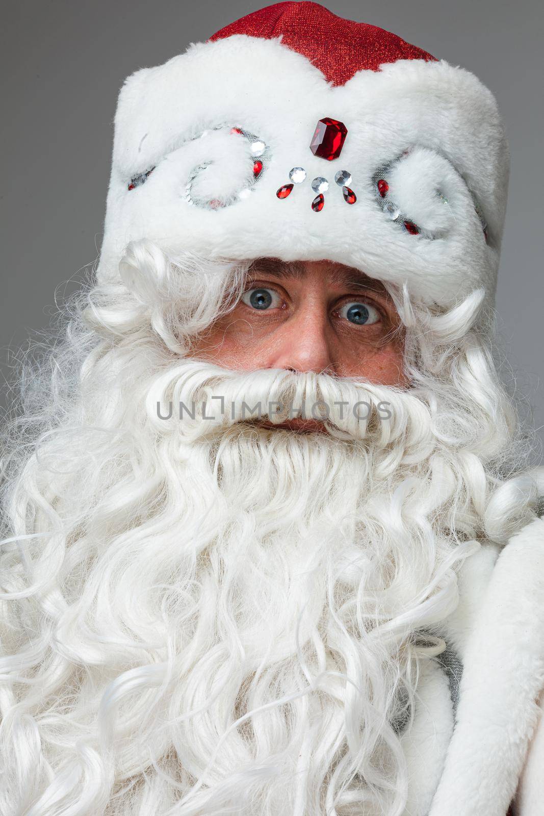 Delighted Santa Claus with white beard. by StudioLucky