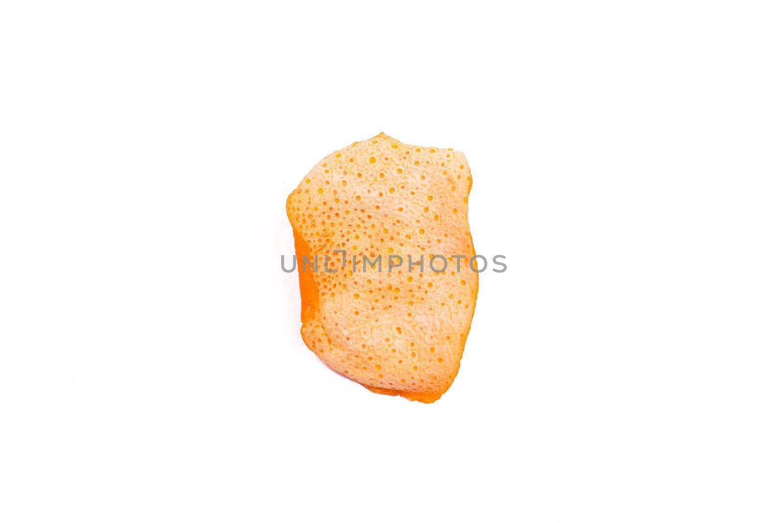 Dried orange peels isolated on a white background.
