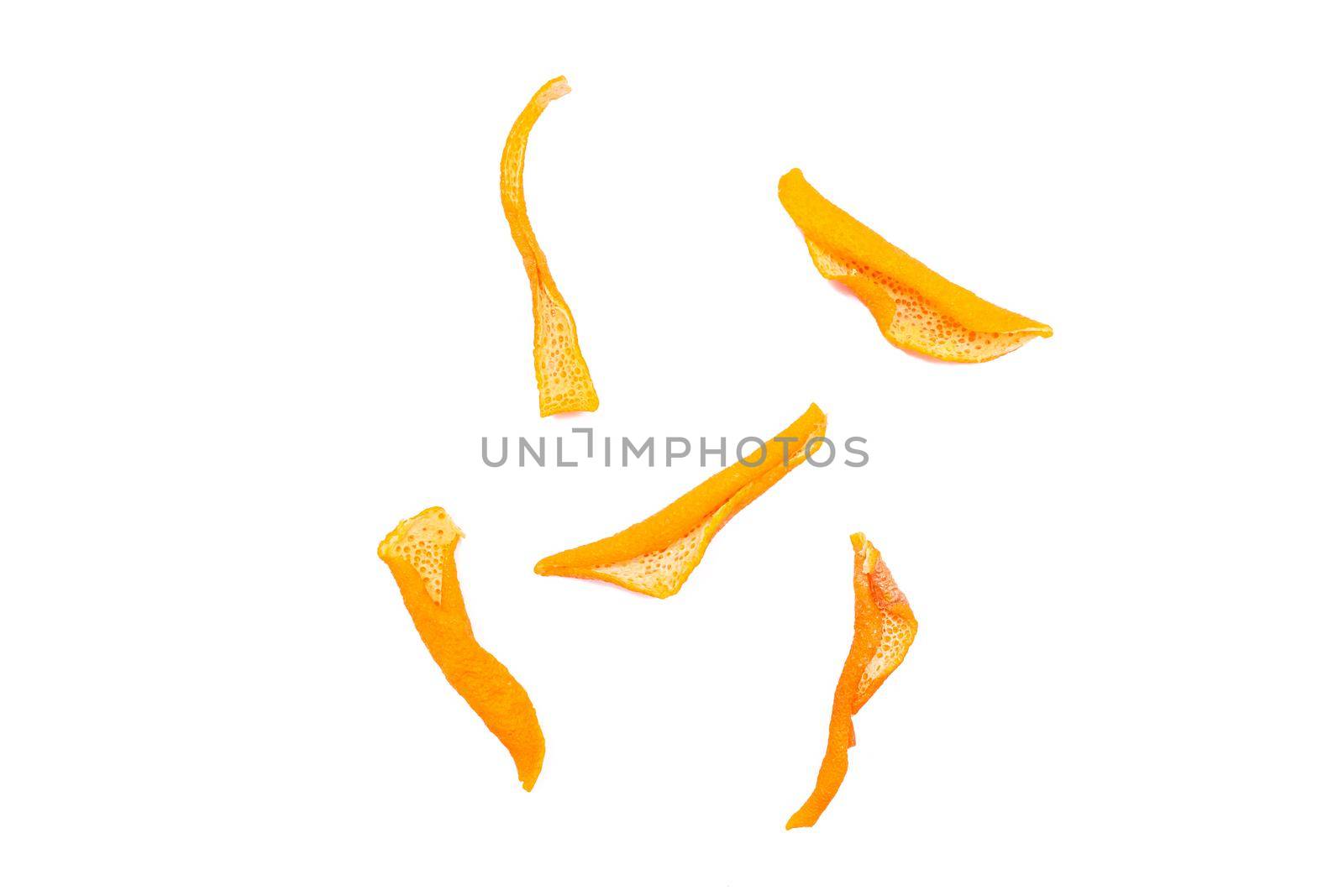 Dried orange peels isolated on a white background.