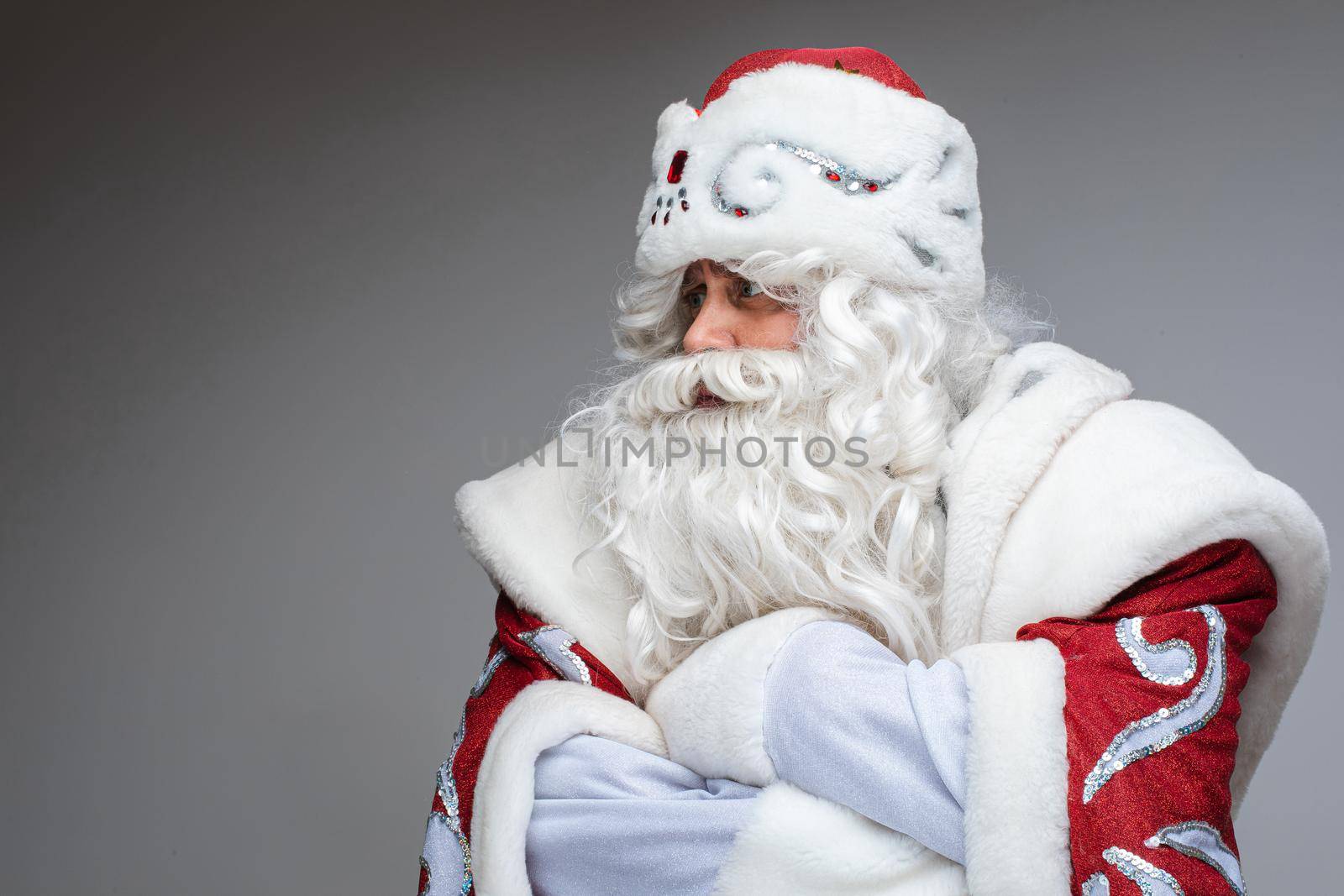 father frost looks aside, picture isolated on white background