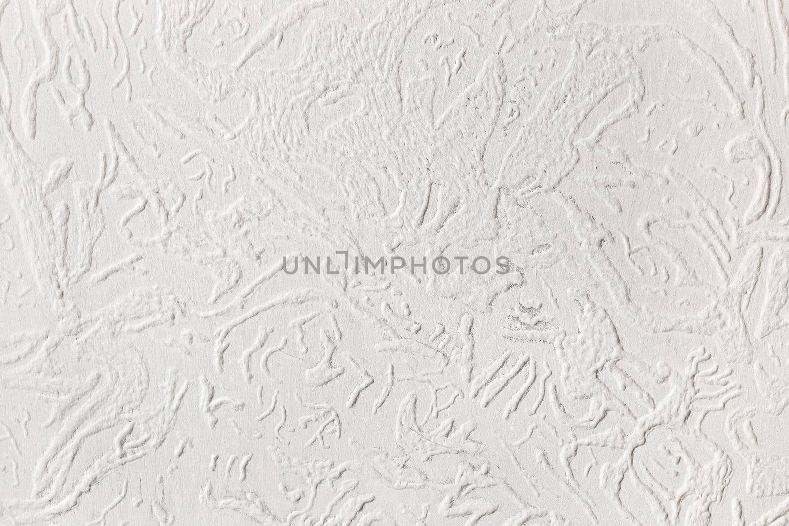 White wall stucco texture with abstract pattern plaster background.