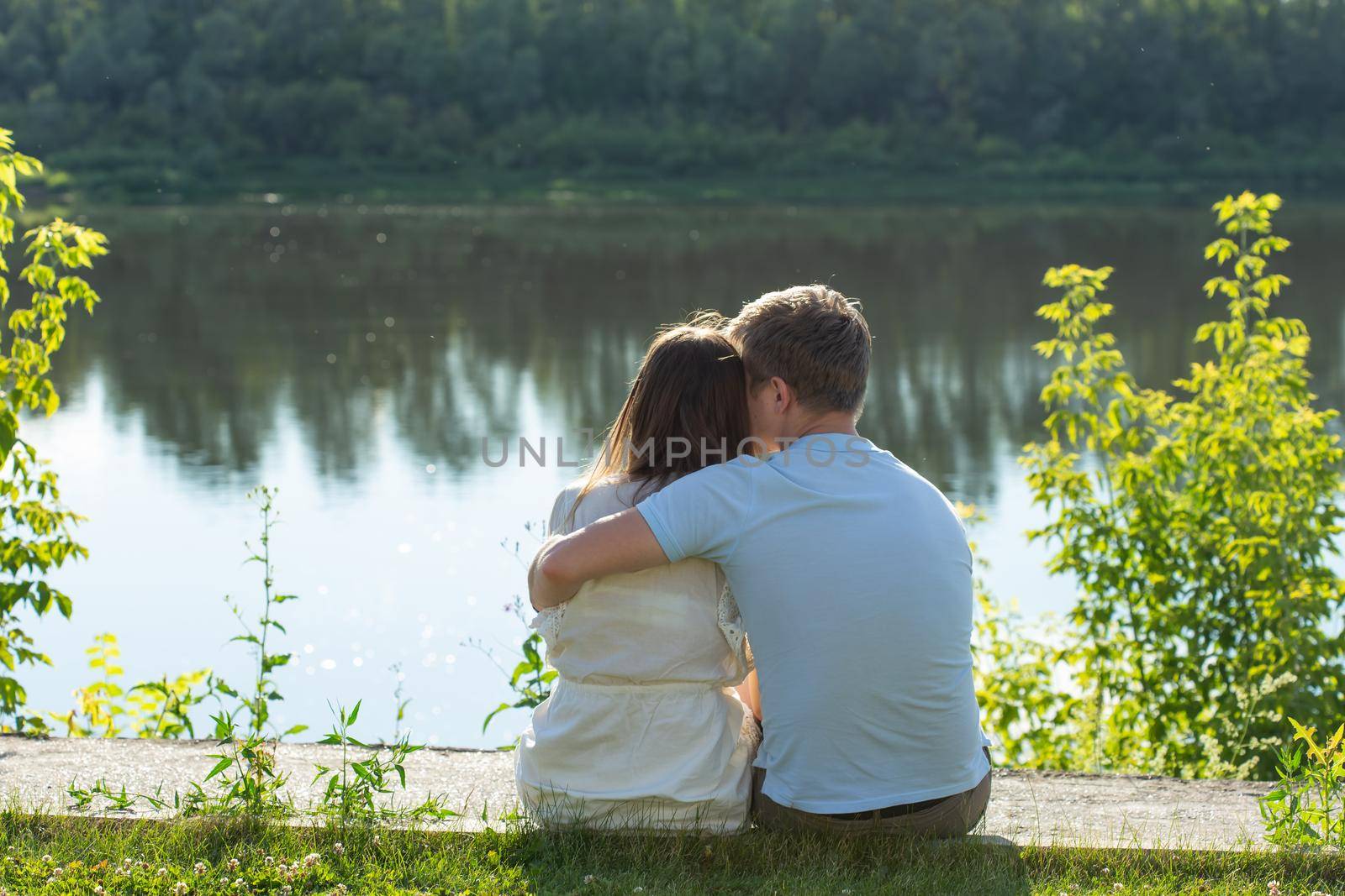 happy romantic couple in love and having fun outdoor in summer day, beauty of nature, harmony concept.