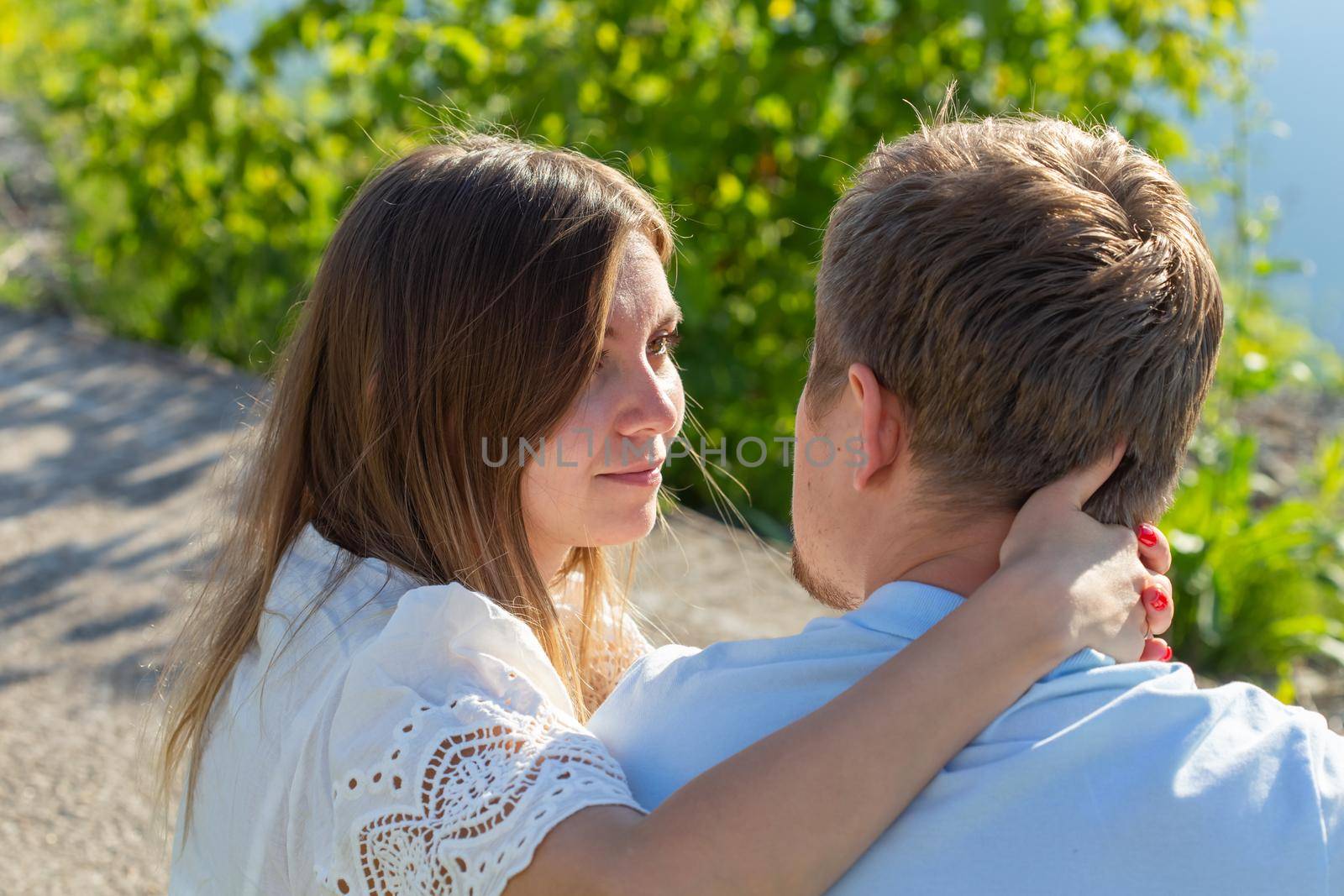 happy romantic couple in love and having fun outdoor in summer day, beauty of nature, harmony concept.