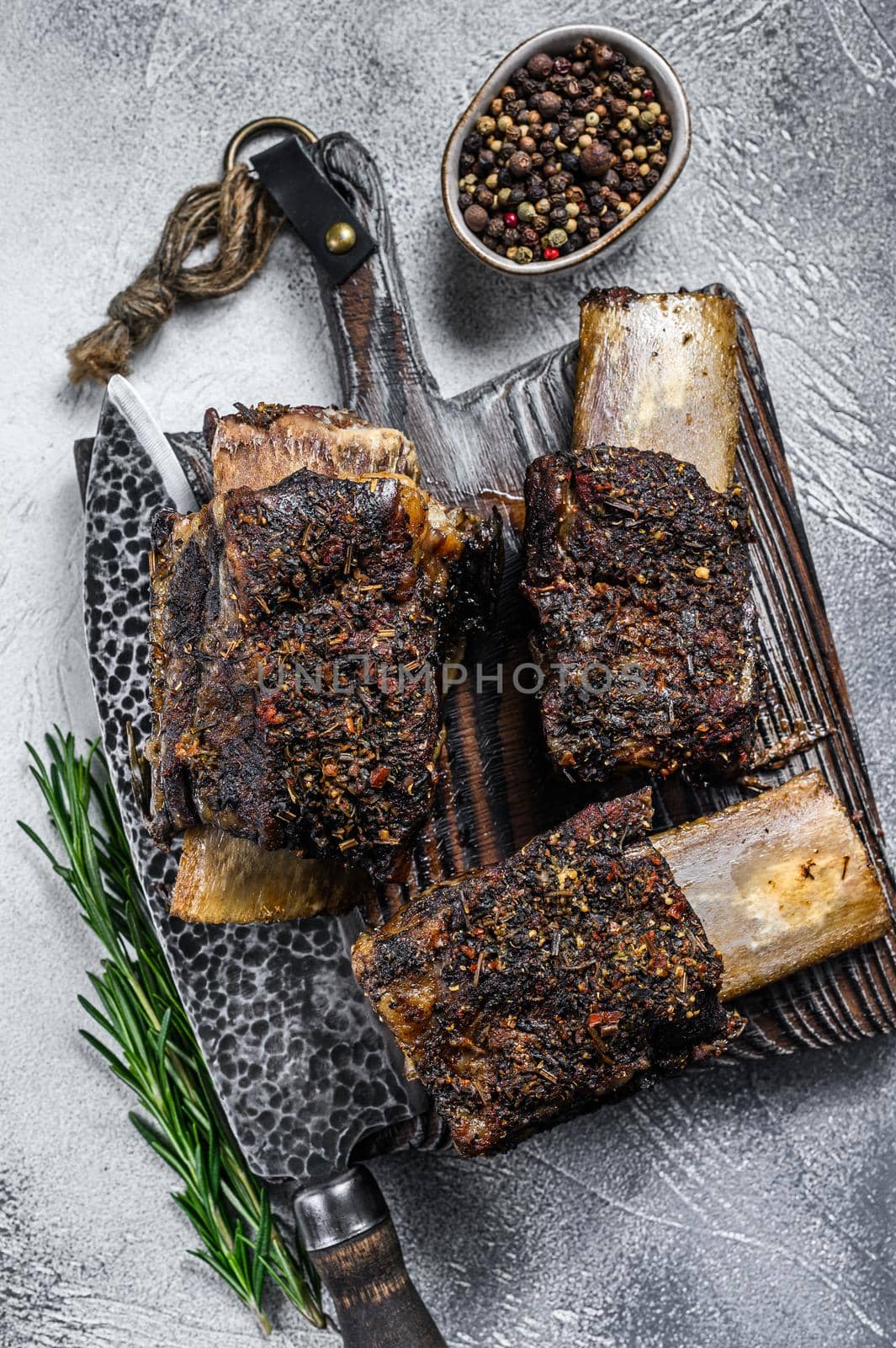 Barbecue short chuck beef ribs with herbs. White background. Top view.