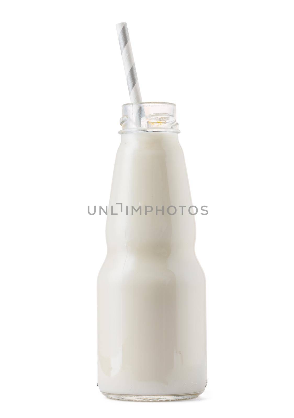 Glass cup of milk with a straw isolated on white background