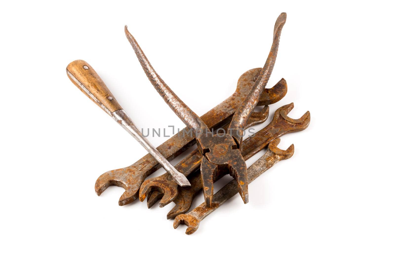 Old rusty tools isolated on a white background