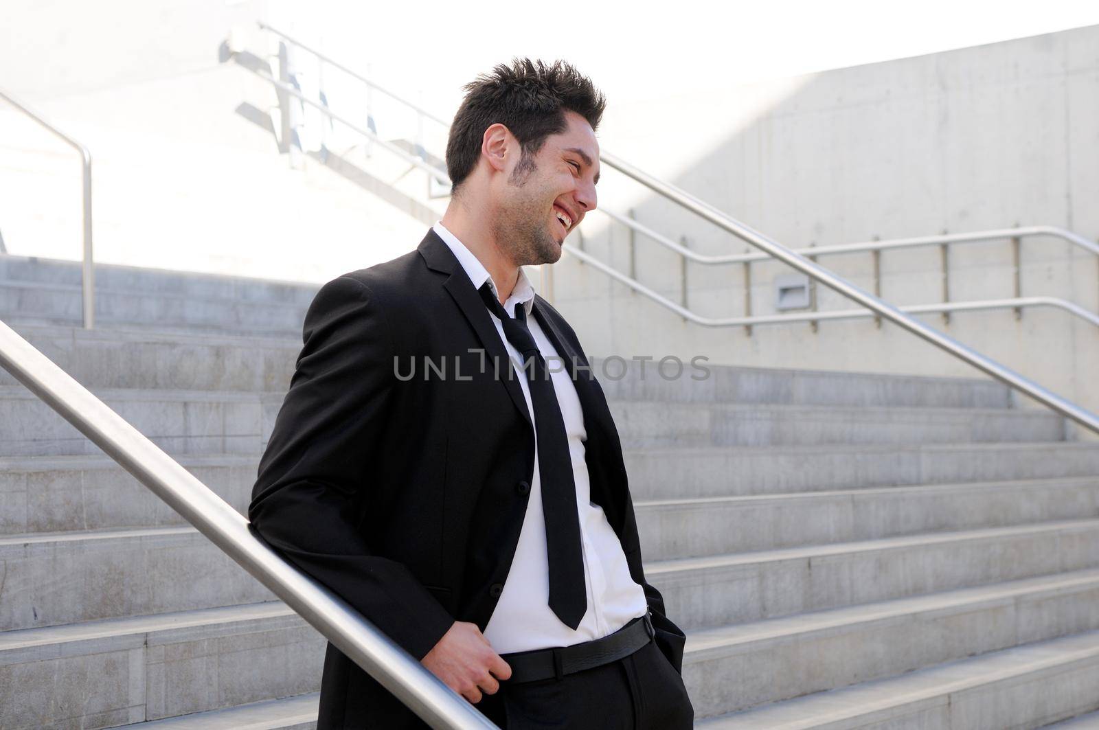 Portrait of a handsome young smiling business man