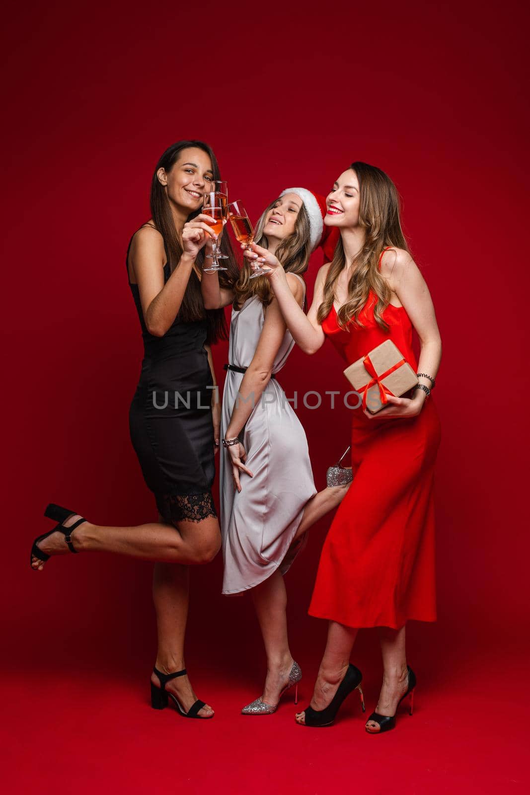 Three gorgeous girlfriends celebrating Valentine's day. by StudioLucky