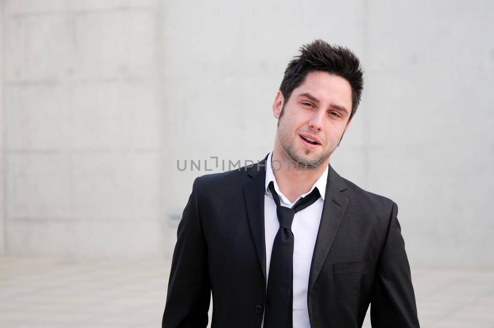 Portrait of a handsome young smiling business man