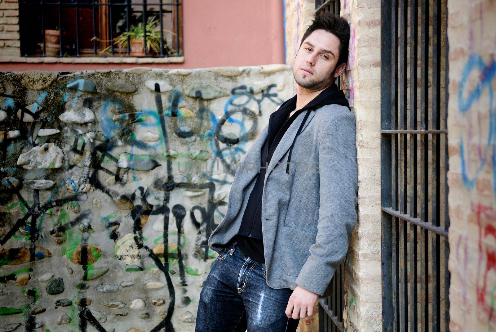 Portrait of handsome man in urban background