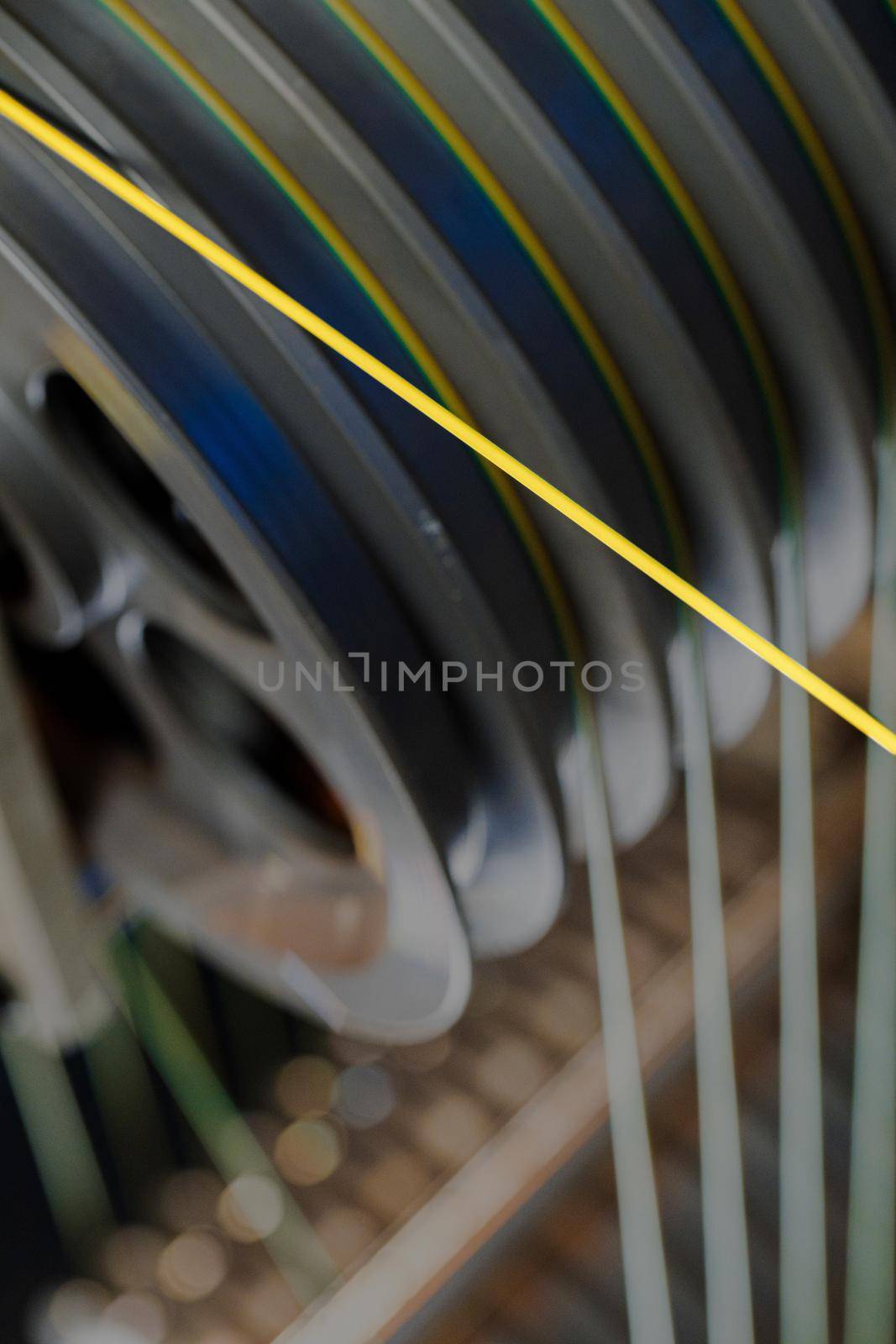 Cable production. Close up of a cable reel, manufacturing zone