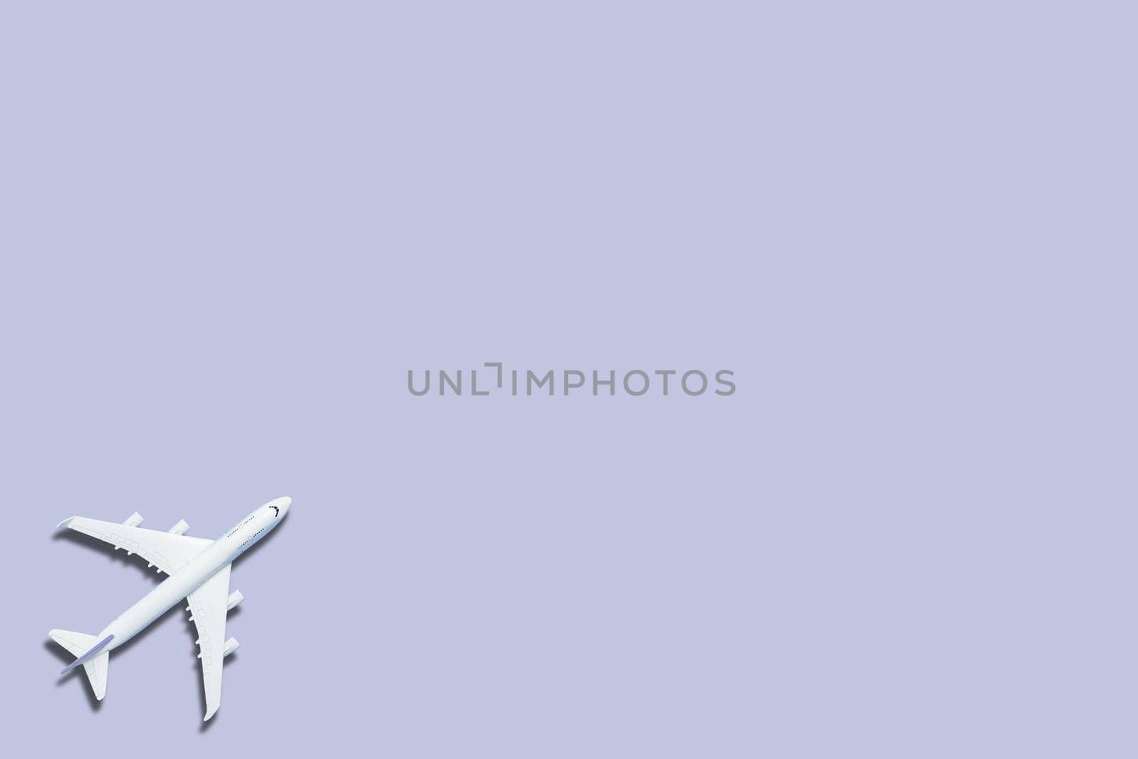 white airplane on a blue background, top view 3d rendering by Andelov13