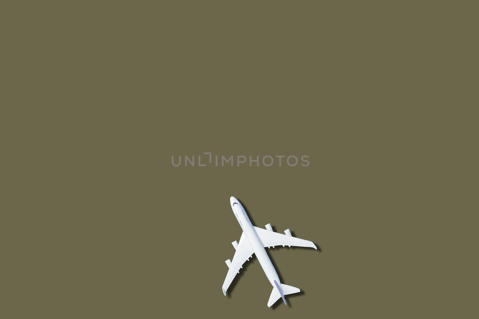 Model plane,airplane on green color background.