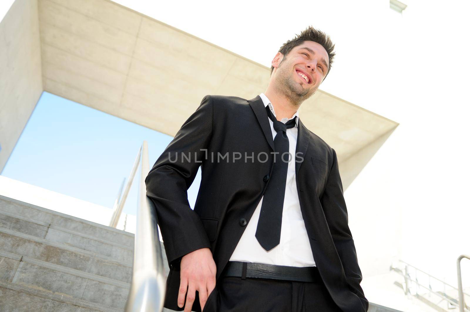 Portrait of a handsome young businessman smiling