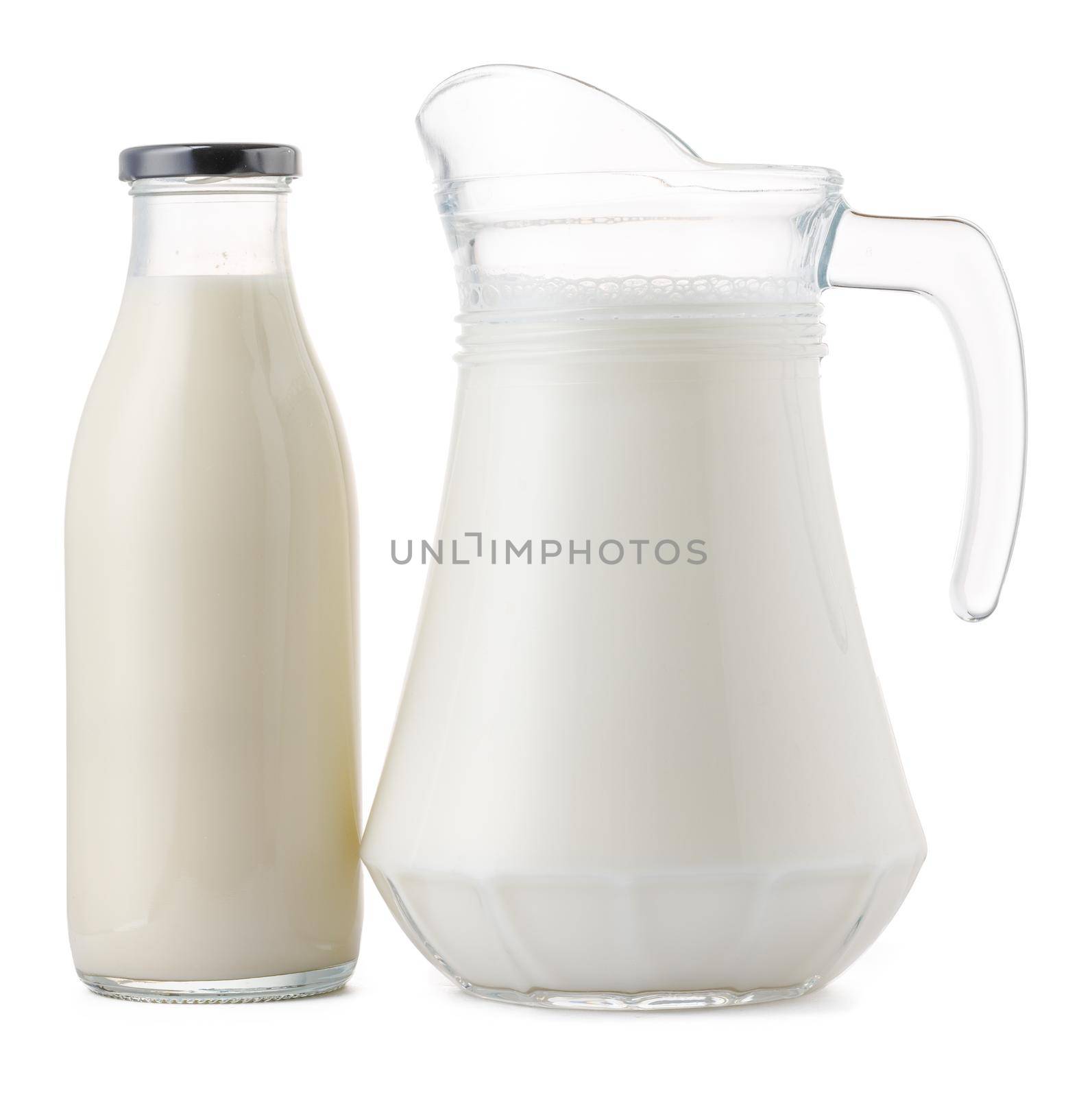 Glassware full of fresh milk isolated on white background