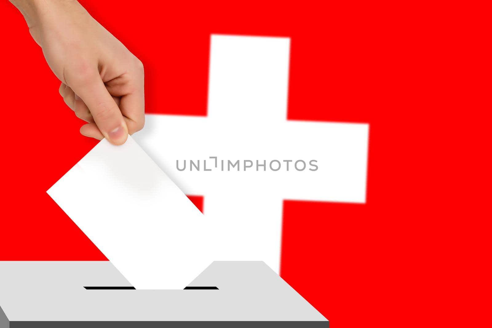 hand drops the ballot election against the background of the Switzerland flag, concept of state elections, referendum by Andelov13