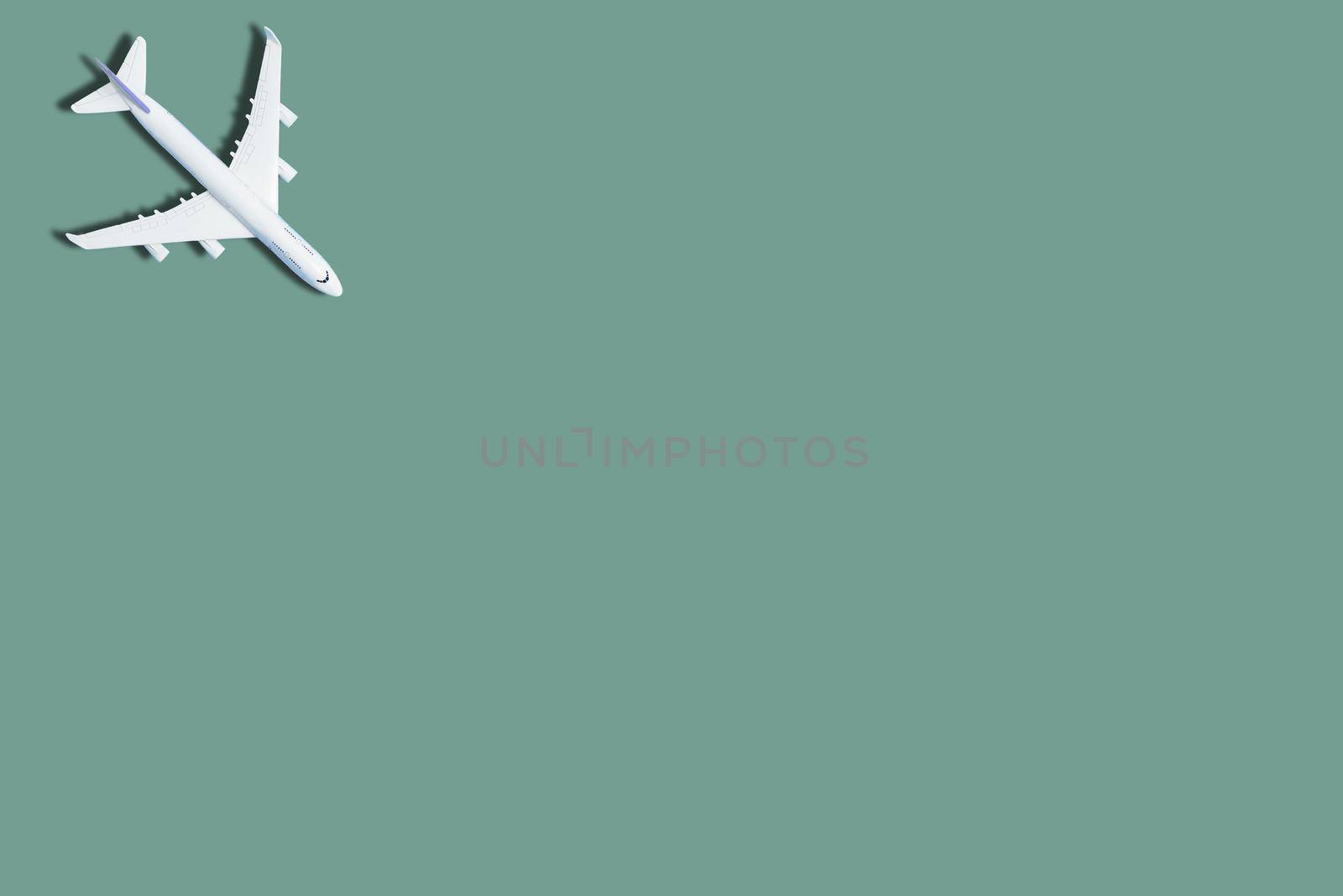 Model plane,airplane on green color background.