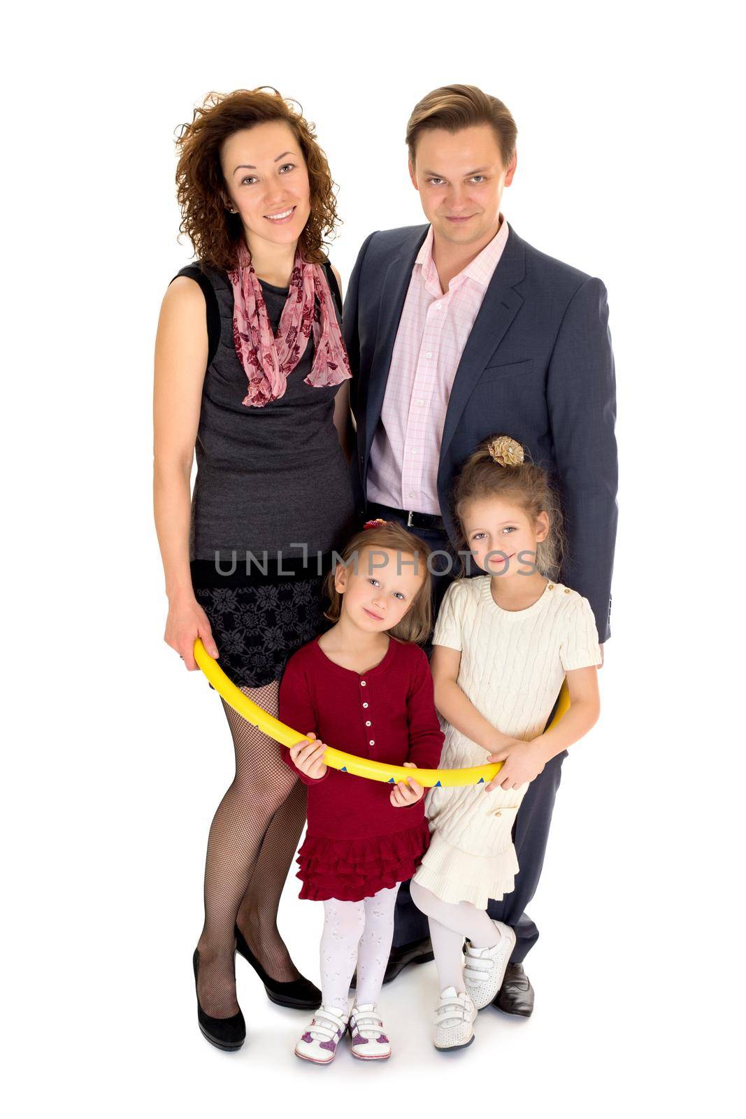 Happy parents with two daughters. All are close to each other - Isolated on white background