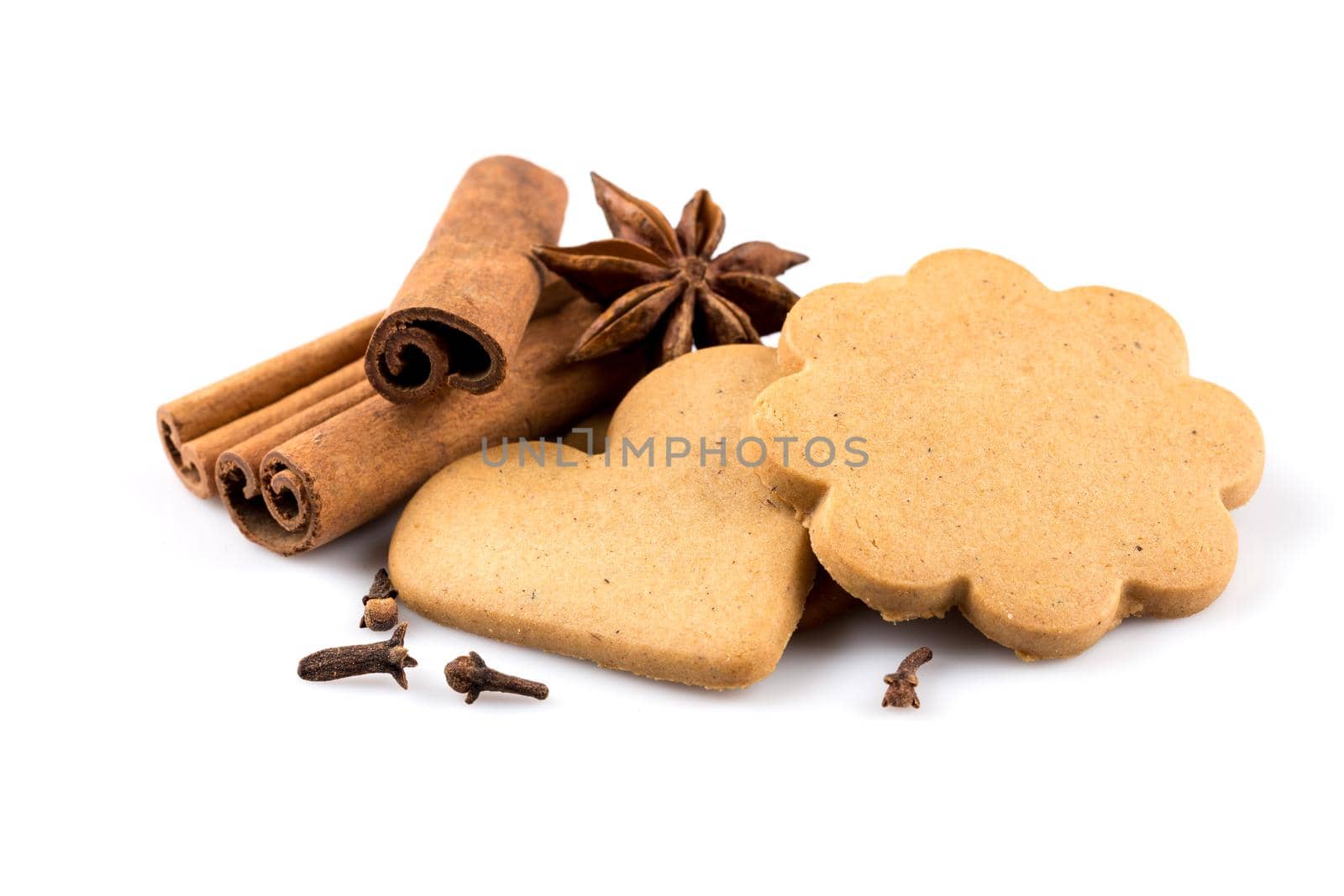 Gingerbread hearts cookies on white background. Christmas decoration