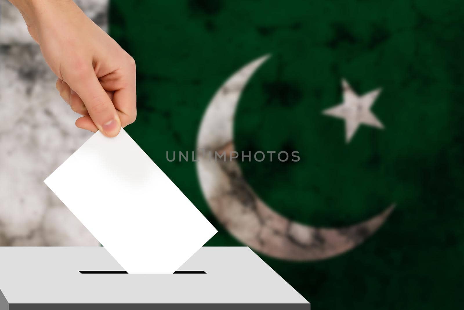 hand drops the ballot election against the background of the flag, concept of state elections, referendum