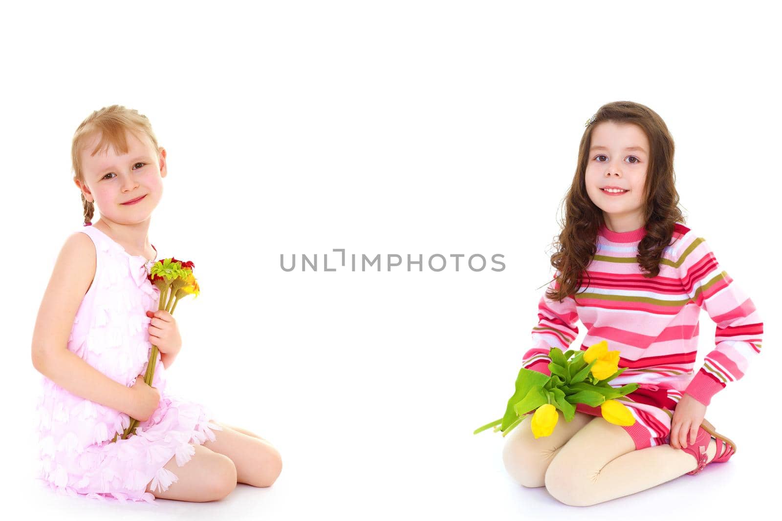 Two cute little girls are sitting with bouquets of flowers in the corners of the frame, in the middle of the frame you can write advertising. The concept of spring mood. Isolated on white background.