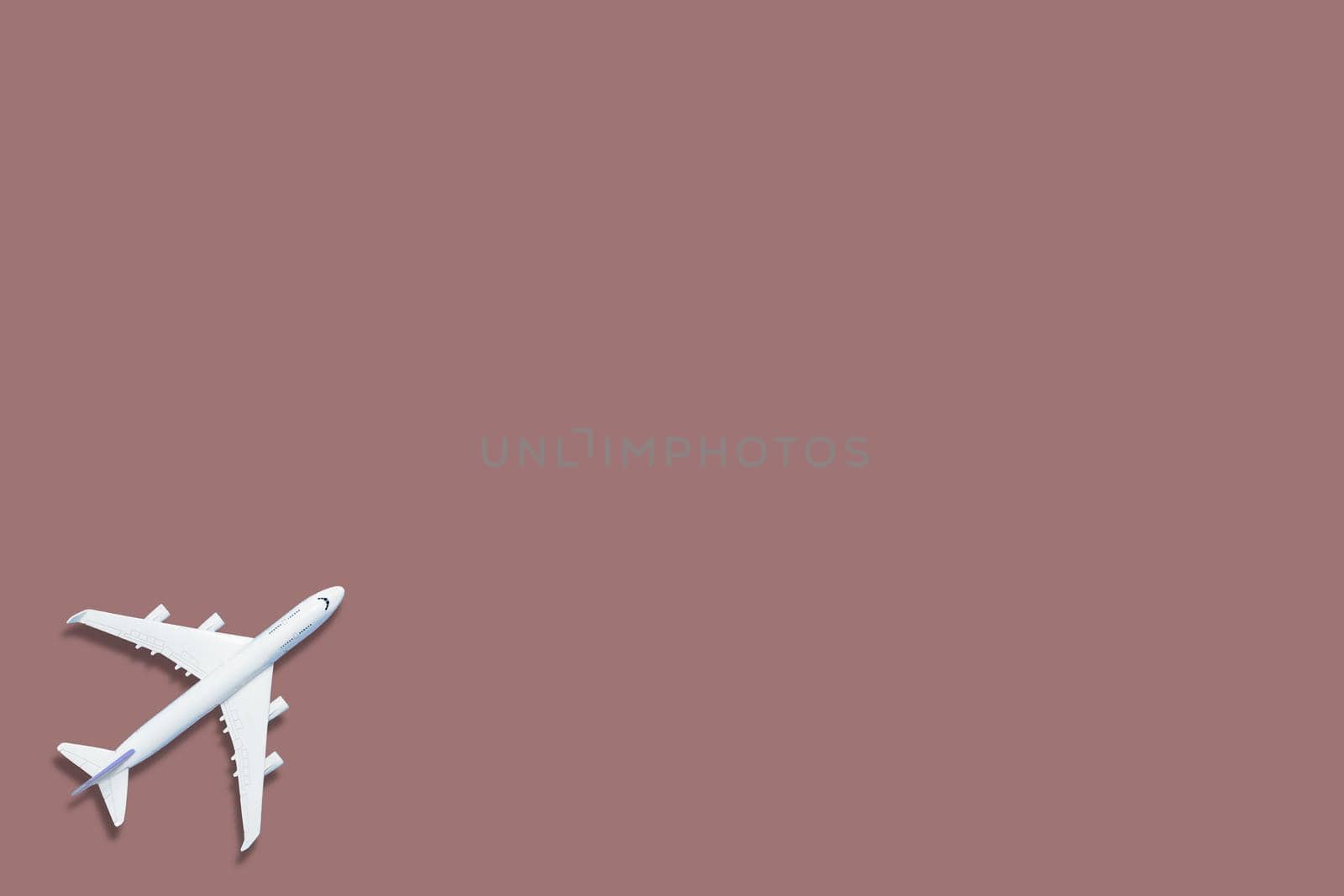 airplane figure on pink background 3d rendering by Andelov13